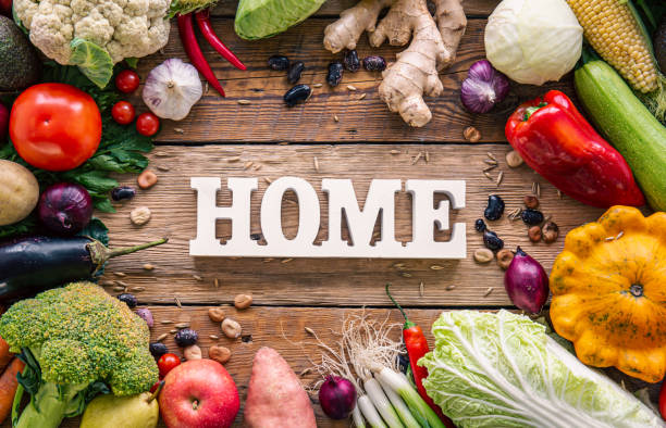 istock Flat lay composition with decorative word home and vegetables. 1428074168