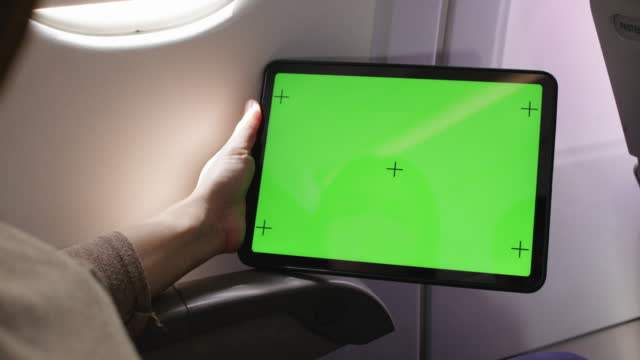 Digital tablet display green screen on airplane