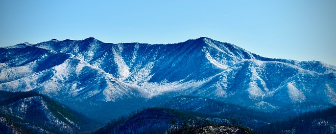 The Smokey Mountains are covered with snow during a morning hike