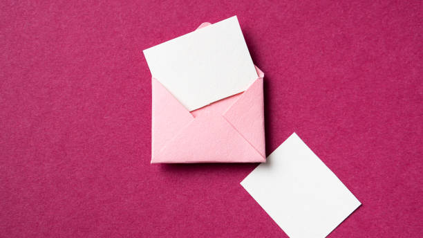 istock Blank white card with pink paper envelope template mockup 1428080844