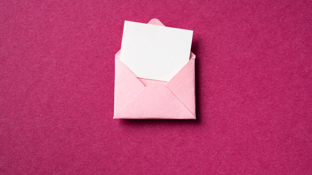 istock Blank white card with pink paper envelope template mockup 1428080853