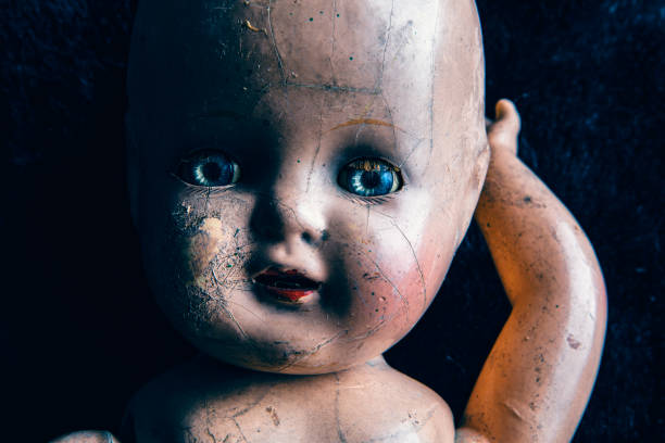 istock Spooky Old Damaged Doll Close Up 1428084647