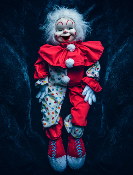 Creepy Clown Doll Laying Down in the Dark