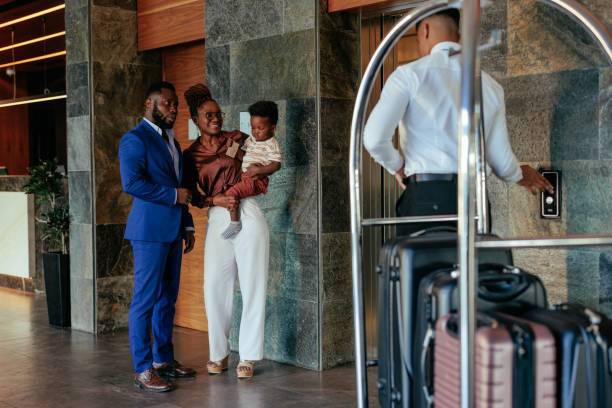 istock Family waiting for elevator in hotel. 1428090621