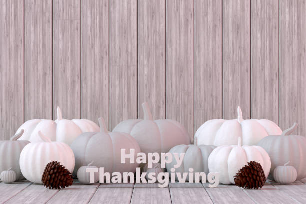 istock Happy Thanksgiving pumpkins on white wood plank background 1428097188