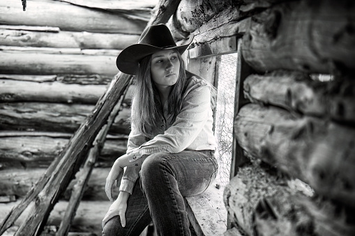 Black and White Cowgirl Environmental Portrait