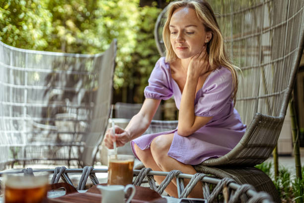 istock Beautiful woman drinking coffee for relaxation 1428104859
