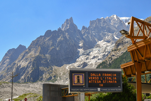 Courmayeur, Aosta Valley, Italy - 07 24 2022: The Mont Blanc Tunnel is a highway tunnel between France and Italy, under the Mont Blanc mountain in the Alps. It links Chamonix, France with Courmayeur, Italy.