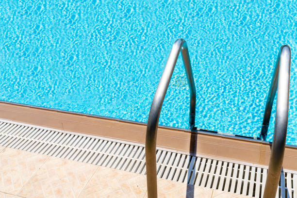 istock Metal steps into the swimming pool 1428108220