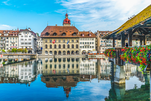 Colorful Chapel Covered Bridge Kapellbrucke Inner Harbor Buildings Reflection Reuss River Lucerne Switzerland. Built in 1365 Oldest Wooden Covered Bridge in Europe