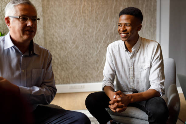 istock Happy businessmen attending a meeting with their diverse team 1428114581