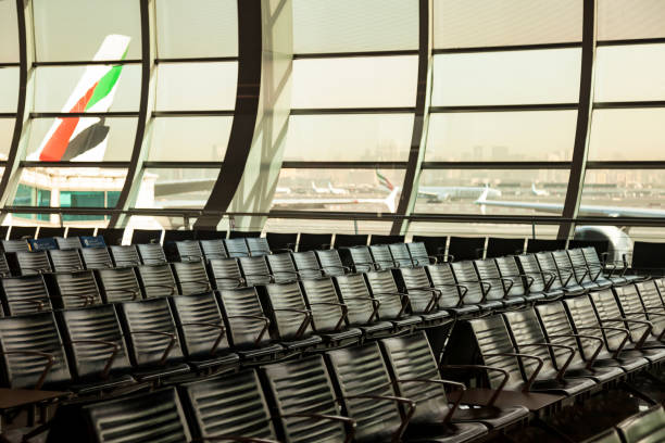 Dubai, UAE - February 1, 2014: The newer Terminal 3 (Emirates) at Dubai International Airport, UAE. It is the single largest building in the world by floor space.