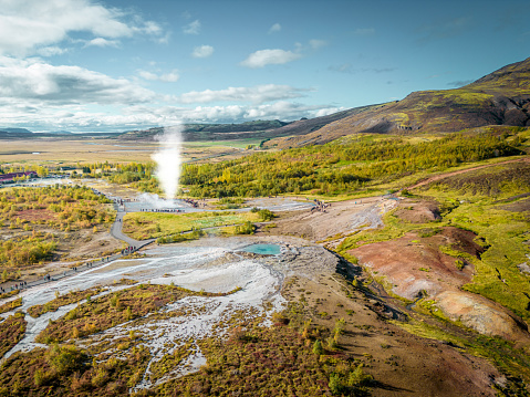 Strokkur is a fountain-type geyser located in a geothermal area beside the Hvítá River in Iceland. It reaches heights between 15–20 metres although it can sometimes erupt up to 40 metres high. Aerial drone view