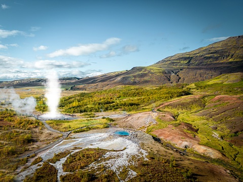 Strokkur is a fountain-type geyser located in a geothermal area beside the Hvítá River in Iceland. It reaches heights between 15–20 metres although it can sometimes erupt up to 40 metres high. Aerial drone view