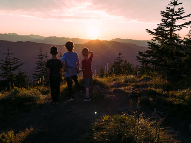 Brothers Watching Sunset Over Mount Rainier