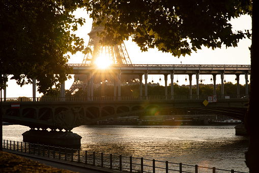 wide view on eiffel tower at seine river at blue hour