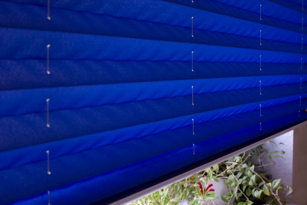 istock Pleated blinds XL closeup on the window 1428185316