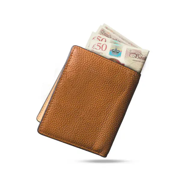 Photo of 3D rendering of British pound notes popping out of a brown leather men’s wallet. British pounds in wallet