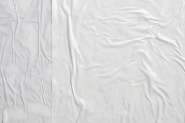 istock white crumpled and creased paper poster texture background 1428192946