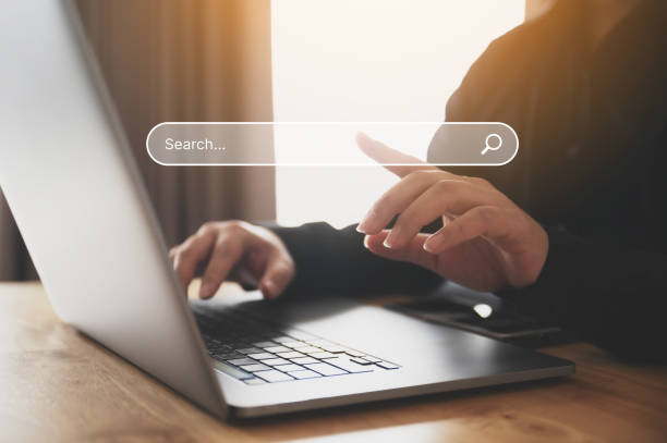 istock Man using computer laptop to find what they are interested in. Searching information data on internet networking concept 1428198737