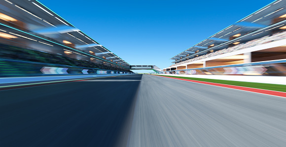 A close up view of two team mates driving at high speed along a straight section of track with an empty  grandstand in the distance. The cars and decals are all custom generic designs. With motion blur to the track.