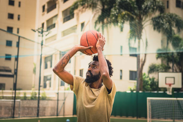 istock Man shooting basketball 1428212792