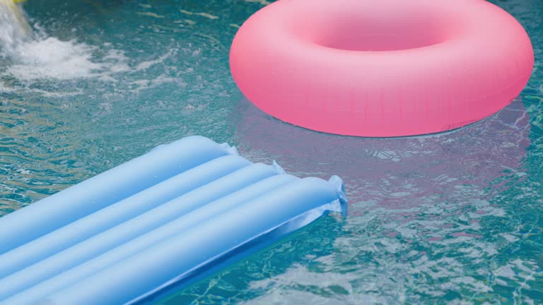 Swimming pool with colorful rubber rings