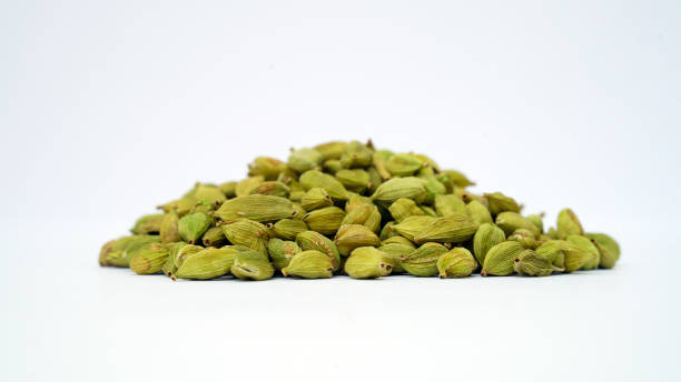istock Cardamom pods and seeds isolated on white background 1428226906
