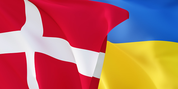 Danish and Ukrainian flags flying in the wind. Denmark stand with Ukraine. 3D rendered image.