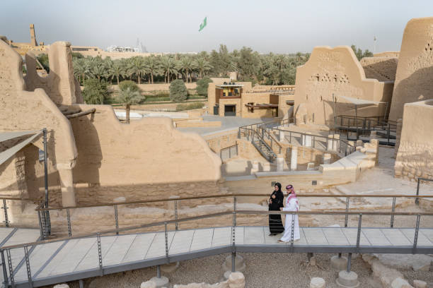 istock Middle Eastern couple crossing footbridge at open air museum 1428228609