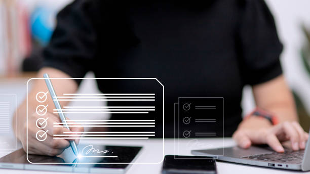 istock Electronic signature concept, business people sign electronic documents on digital documents, paperless office, future business contract signing. 1428232408