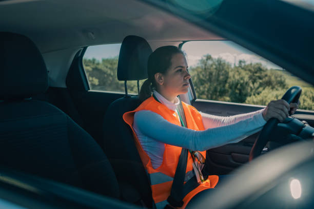 istock An engineer driving a car in a wind farm 1428233929