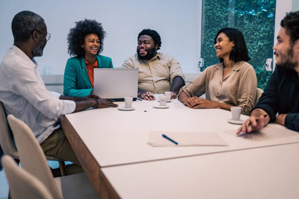 istock People at a meeting table 1428233969