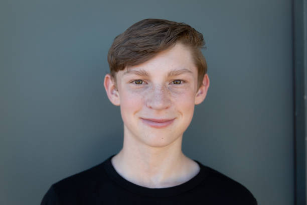 istock One teenage boy looking at the camera smiling 1428233981
