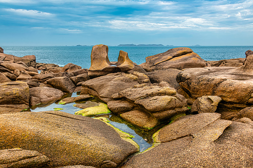 Famous granite rocks at the cote de granite rose in Tregastel in Brittany, France