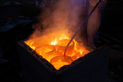 Crucible in a high heat furnace.