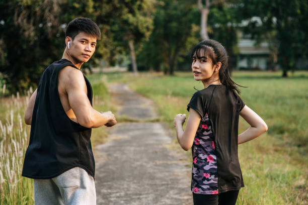 istock Men and women exercise by running. 1428238859