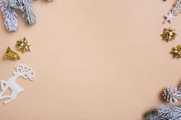 istock Christmas flat lay composition with bows, cones, pine on colored background top view. Copy space 1428240008