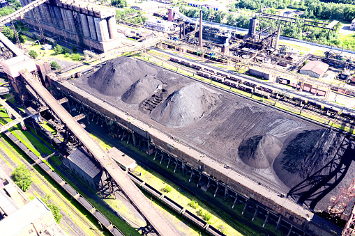 Open-air coking coal warehouse on the territory of coke plant. View from above