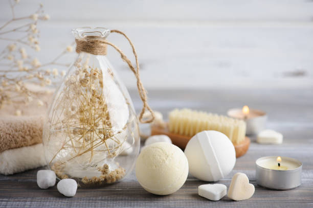 istock Bath bombs with dry flowers and lit candles 1428246412