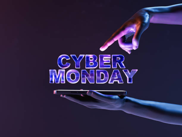 istock Cyber Monday text against gray background with crop person using smartphone 1428249019