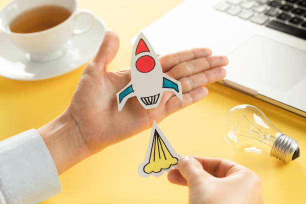 istock Business Person with Startup Rocket 1428254495