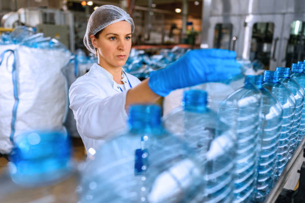istock Female engineer working on maintenance in bottling plant 1428254545