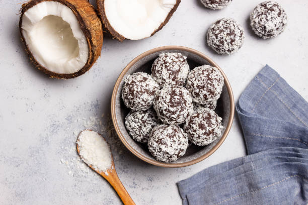 Coconut chocolate balls. Candy. Dessert. Vegetarian food.