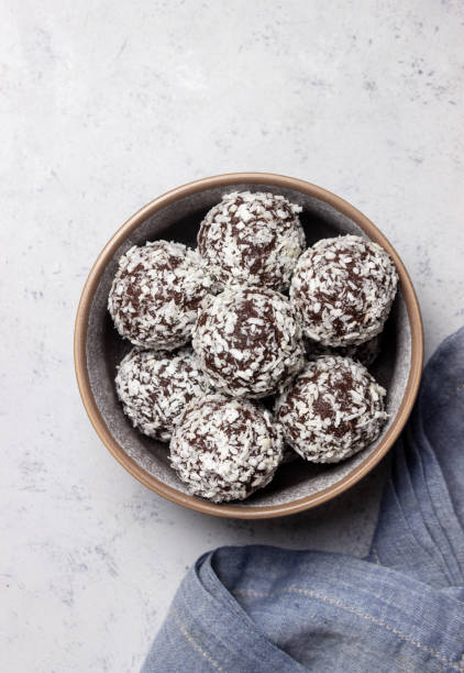 istock Coconut chocolate balls. Candy. Dessert. Vegetarian food. 1428258048