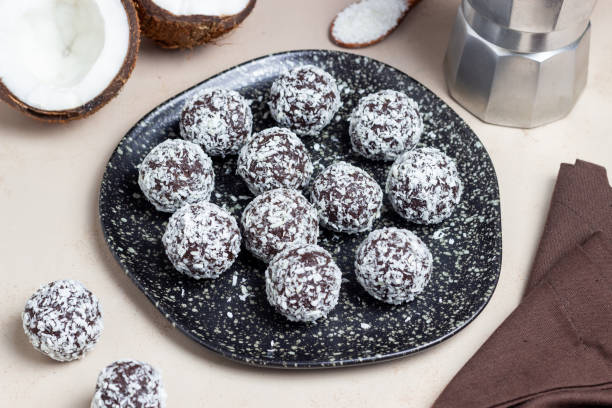istock Coconut chocolate balls. Candy. Dessert. Vegetarian food. 1428258082