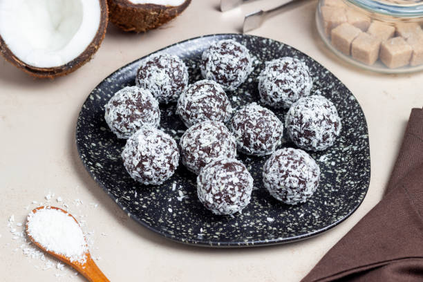 istock Coconut chocolate balls. Candy. Dessert. Vegetarian food. 1428258101