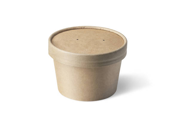 istock Brown paper cup with lid on white 1428261813