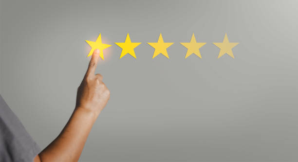 istock Customer service feedback. Business person are touching the virtual screen on happy Smiley face icon to give satisfaction in service. Customer service and Satisfaction concept, rating very impressed. 1428264304