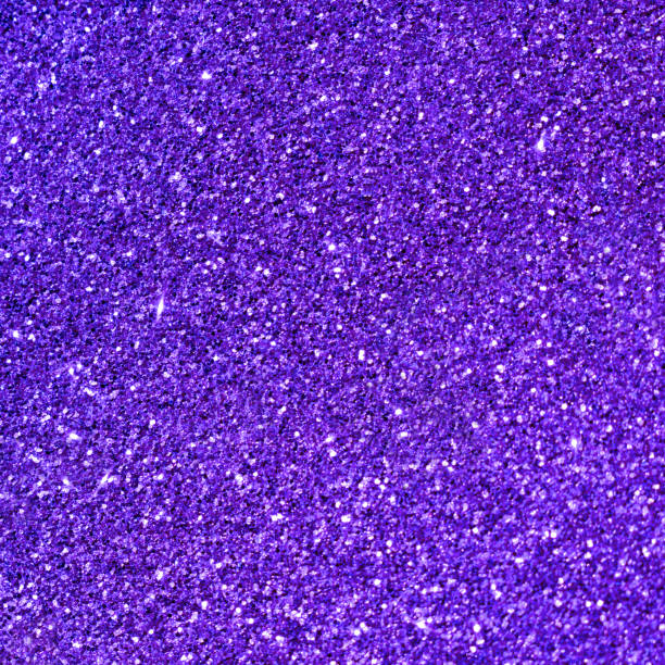 istock Purple glitter sparkling light background. 1428266850